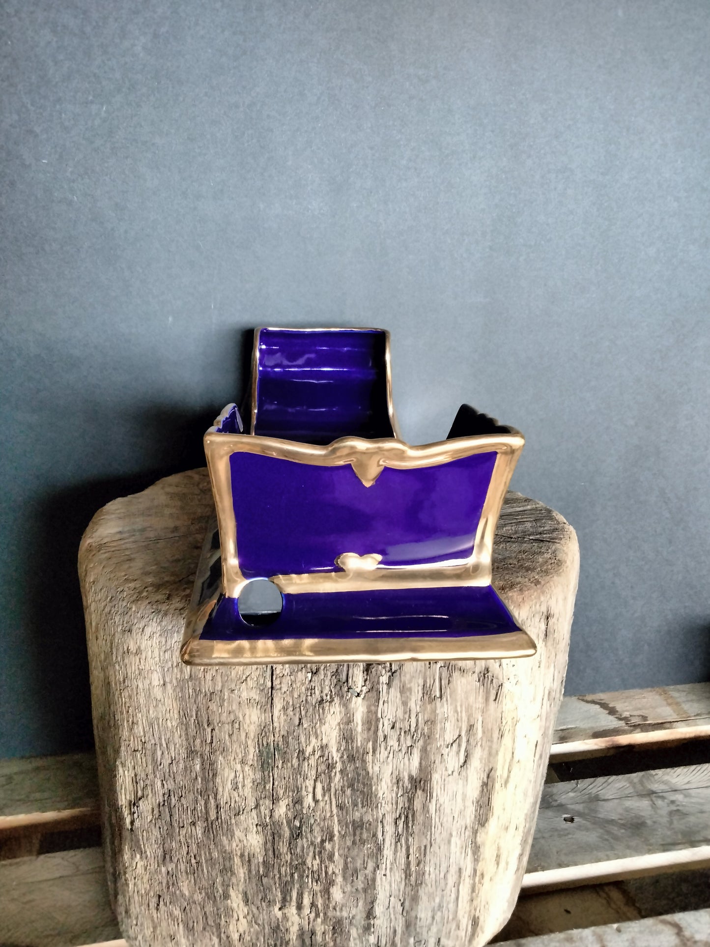 The Jewel Of Russia Vodka handmade porcelain cobalt blue sled with a true gold paint trim