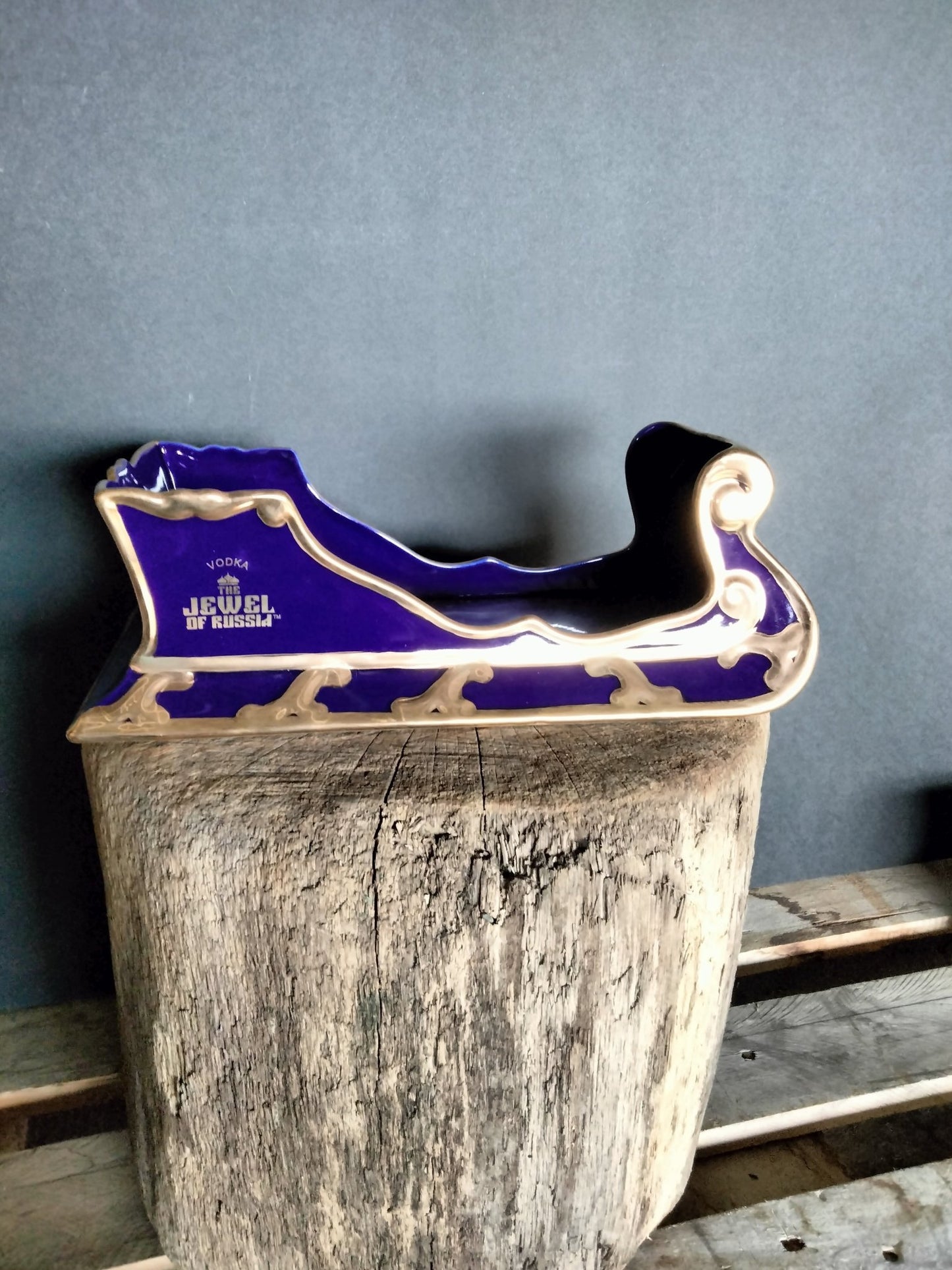The Jewel Of Russia Vodka handmade porcelain cobalt blue sled with a true gold paint trim - Jewel of Russia